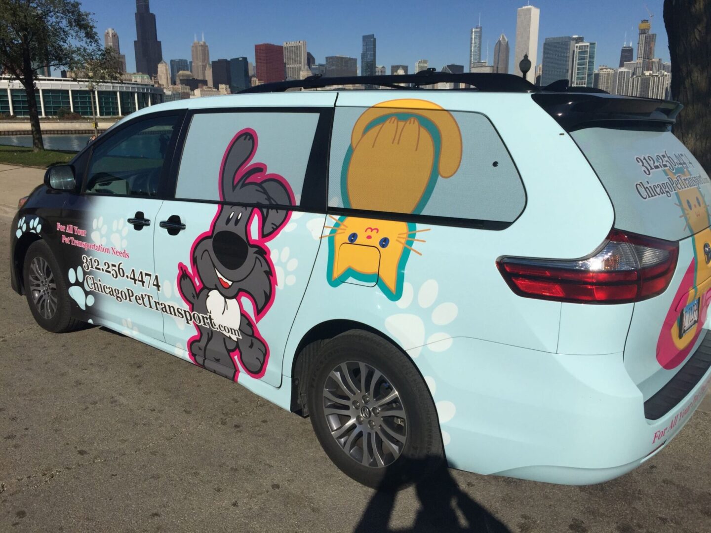 A van with some cartoon characters painted on it